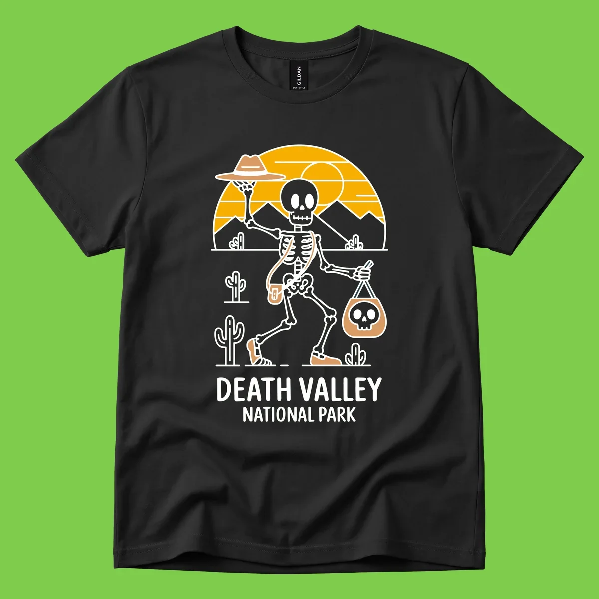 Skeleton cowboy holding skull pouch in Death Valley desert landscape with cacti, mountains, and golden sun rays