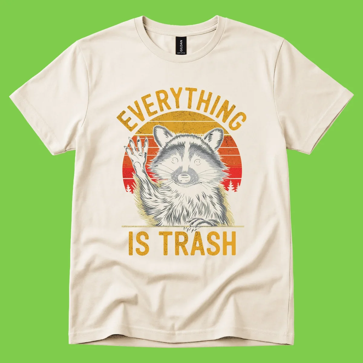 Vintage-style illustration of a raccoon with raised paw against retro sunset stripes, text reading 'Everything Is Trash' in distressed gold lettering