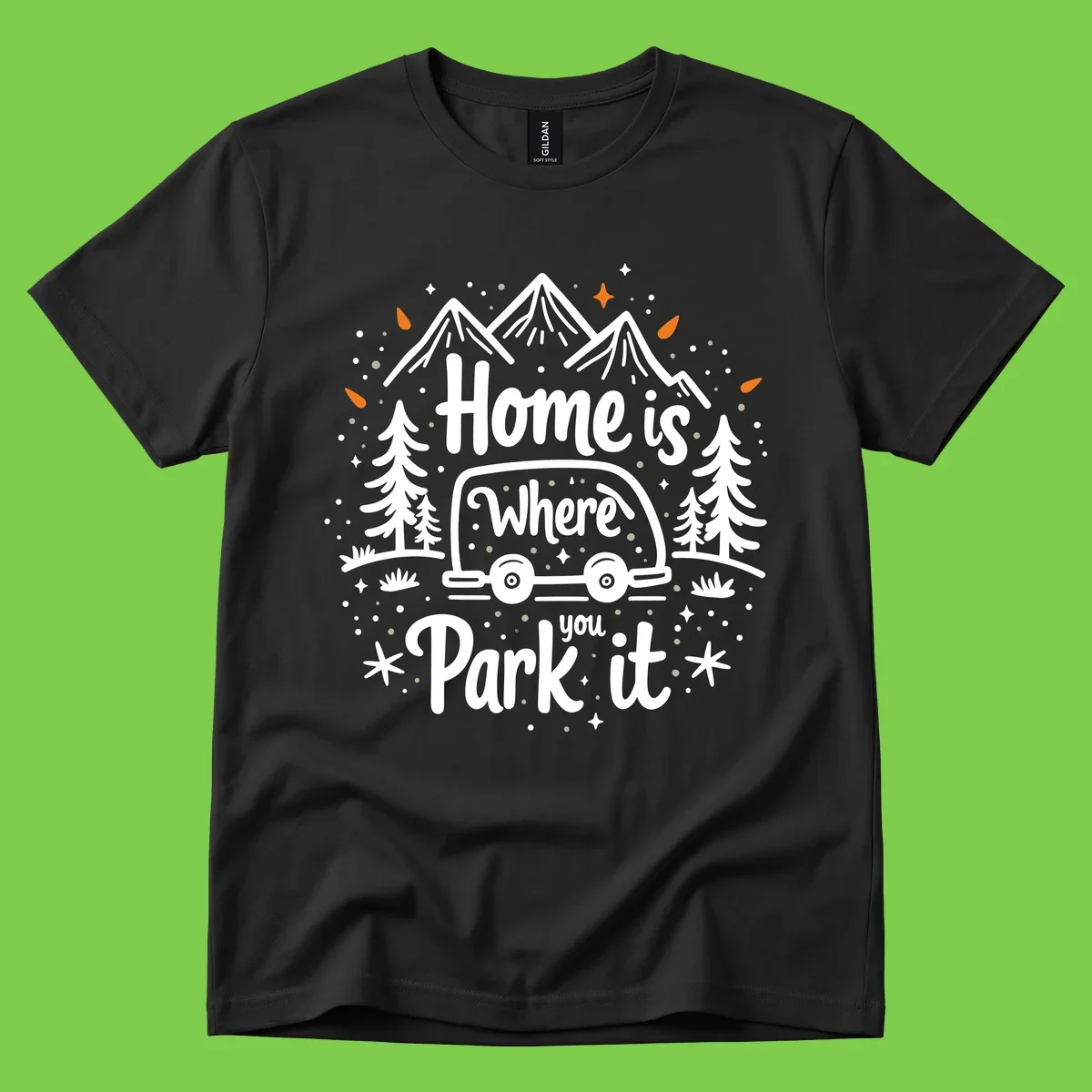 Illustrated winter camping scene with travel trailer, mountains, trees, and snowflakes with text 'Home is Where you Park it'