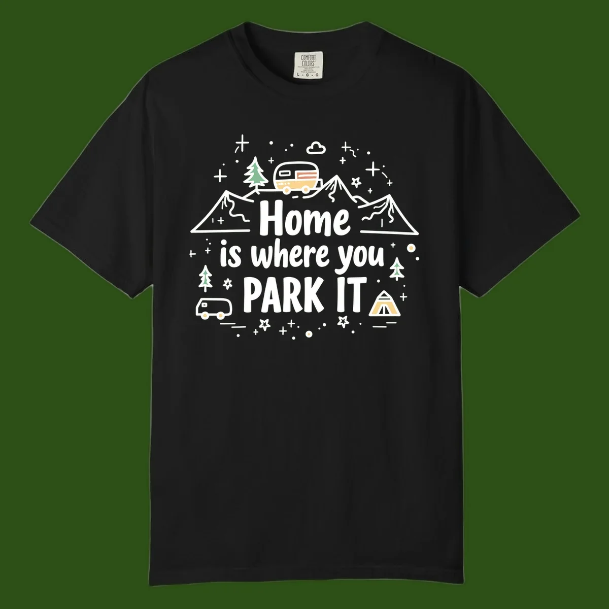 Illustrated design with vintage travel trailer parked on mountain road, evergreen trees, tent, and text reading 'Home is where you park it' on gray background.