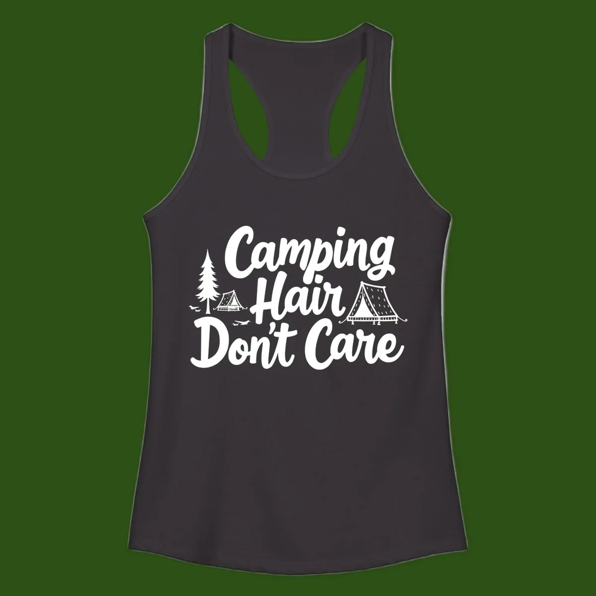 White text reading 'Camping Hair Don't Care' with illustrated tent and evergreen tree designs on gray background
