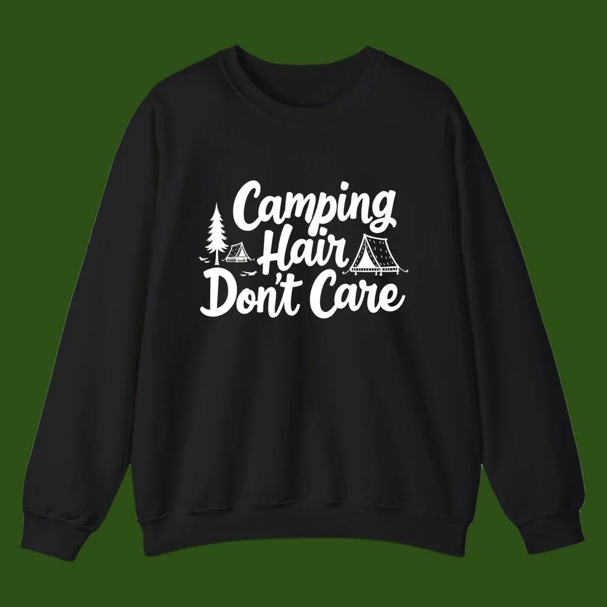 White text reading 'Camping Hair Don't Care' with illustrated tent and evergreen tree designs on gray background