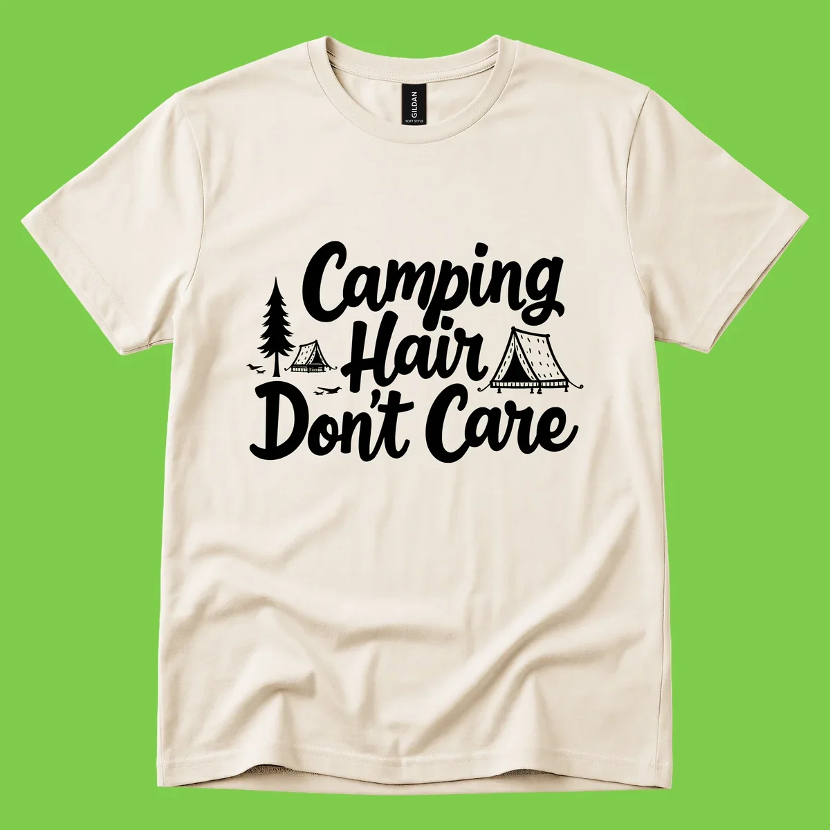 White text reading 'Camping Hair Don't Care' with illustrated tent and evergreen tree designs on gray background