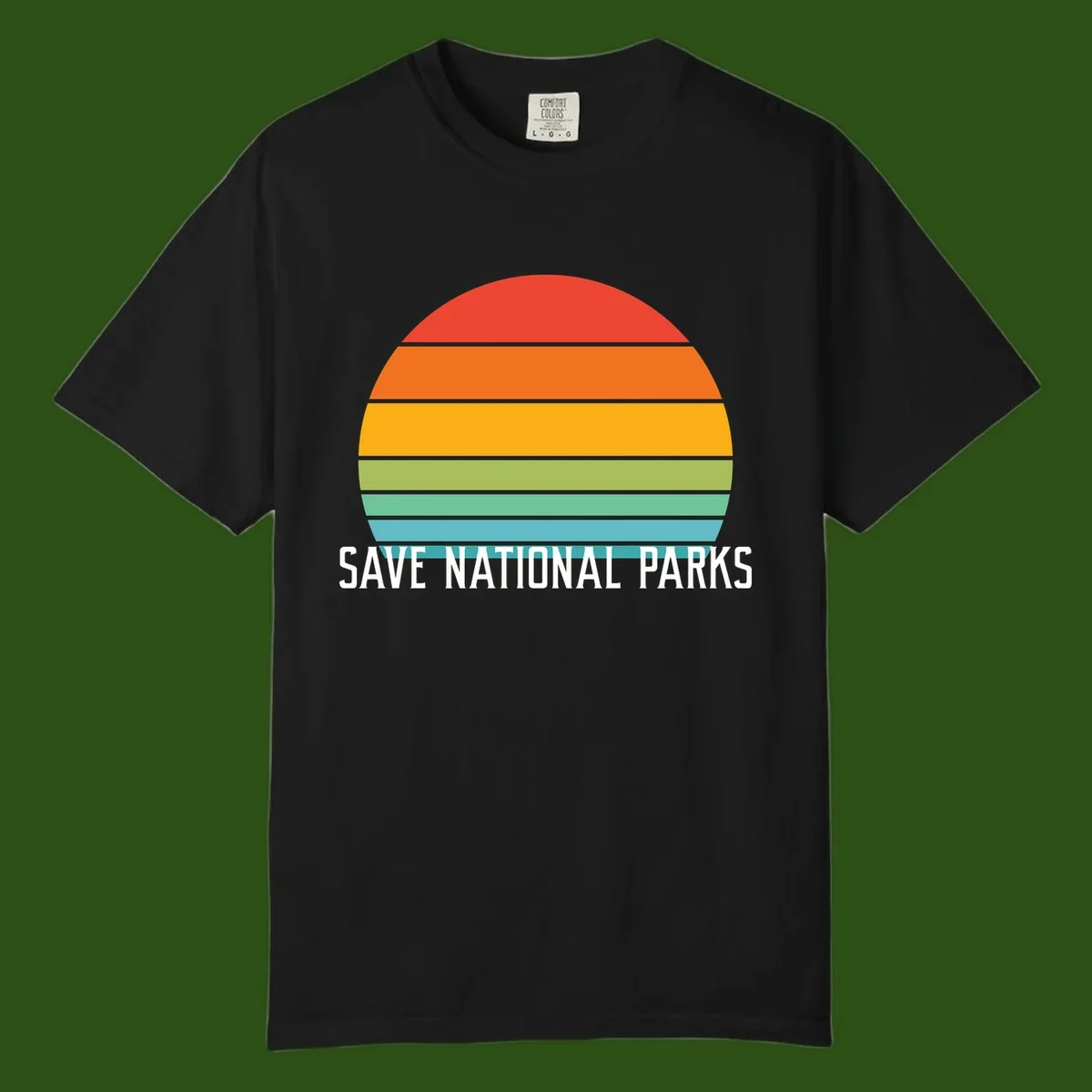 Retro layered sunset design with save national parks text in white, featuring horizontal color bands in red, orange, yellow, green, and blue.