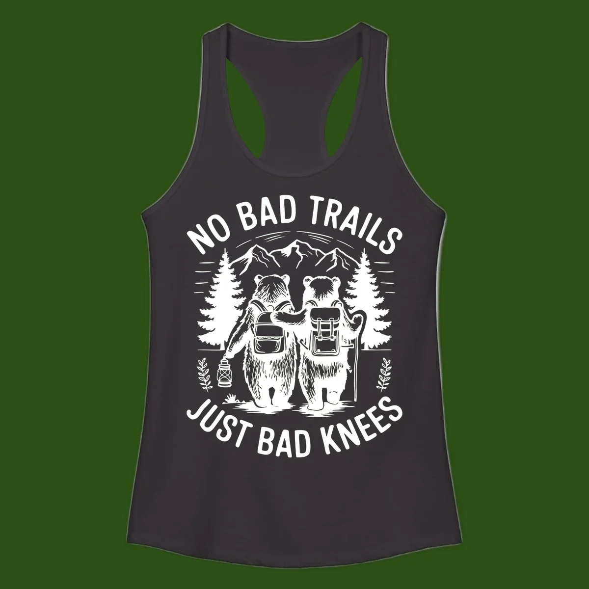 Two cartoon bears with backpacks hiking in mountains with text 'No Bad Trails Just Bad Knees' - humorous outdoor camping design
