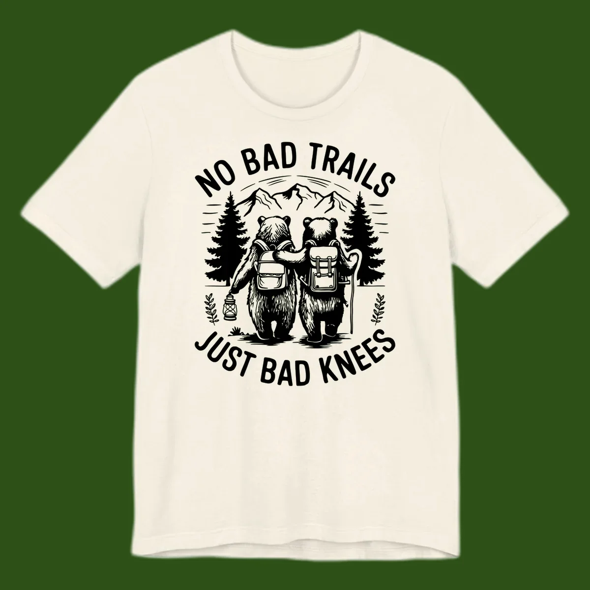 Two cartoon bears with backpacks hiking in mountains with text 'No Bad Trails Just Bad Knees' - humorous outdoor camping design