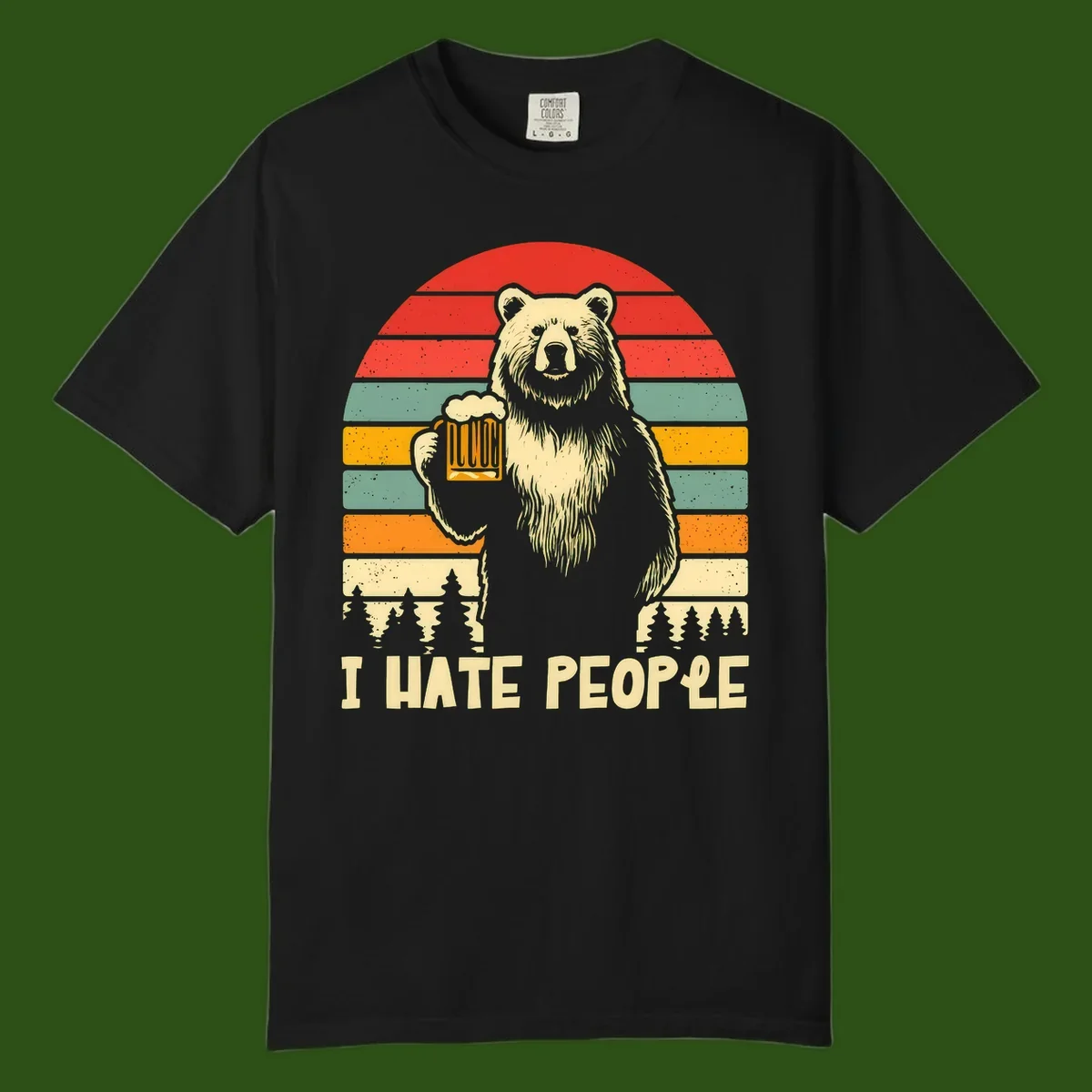 Retro illustration of a grizzly bear holding a beer mug against colorful horizontal stripes with forest and mountain silhouettes, text reads 'I HATE PEOPLE'