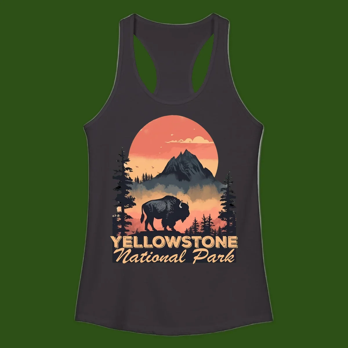 Yellowstone bison national park design: silhouette of a bison in misty forest with mountain peak and sunset sky