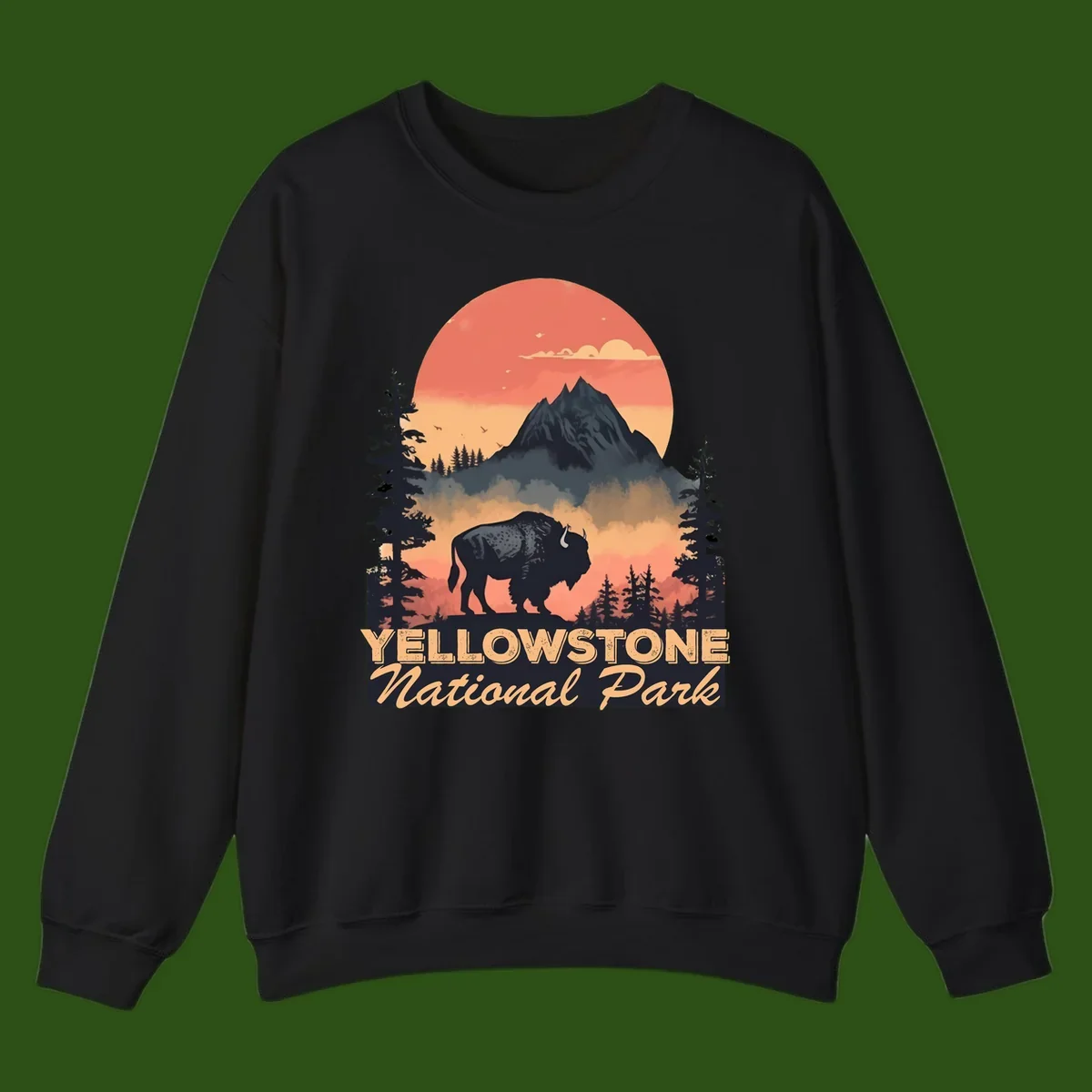 Yellowstone bison national park design: silhouette of a bison in misty forest with mountain peak and sunset sky