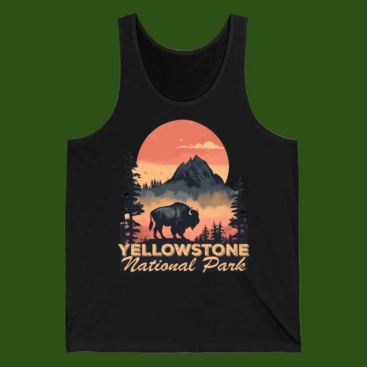 Yellowstone bison national park design: silhouette of a bison in misty forest with mountain peak and sunset sky