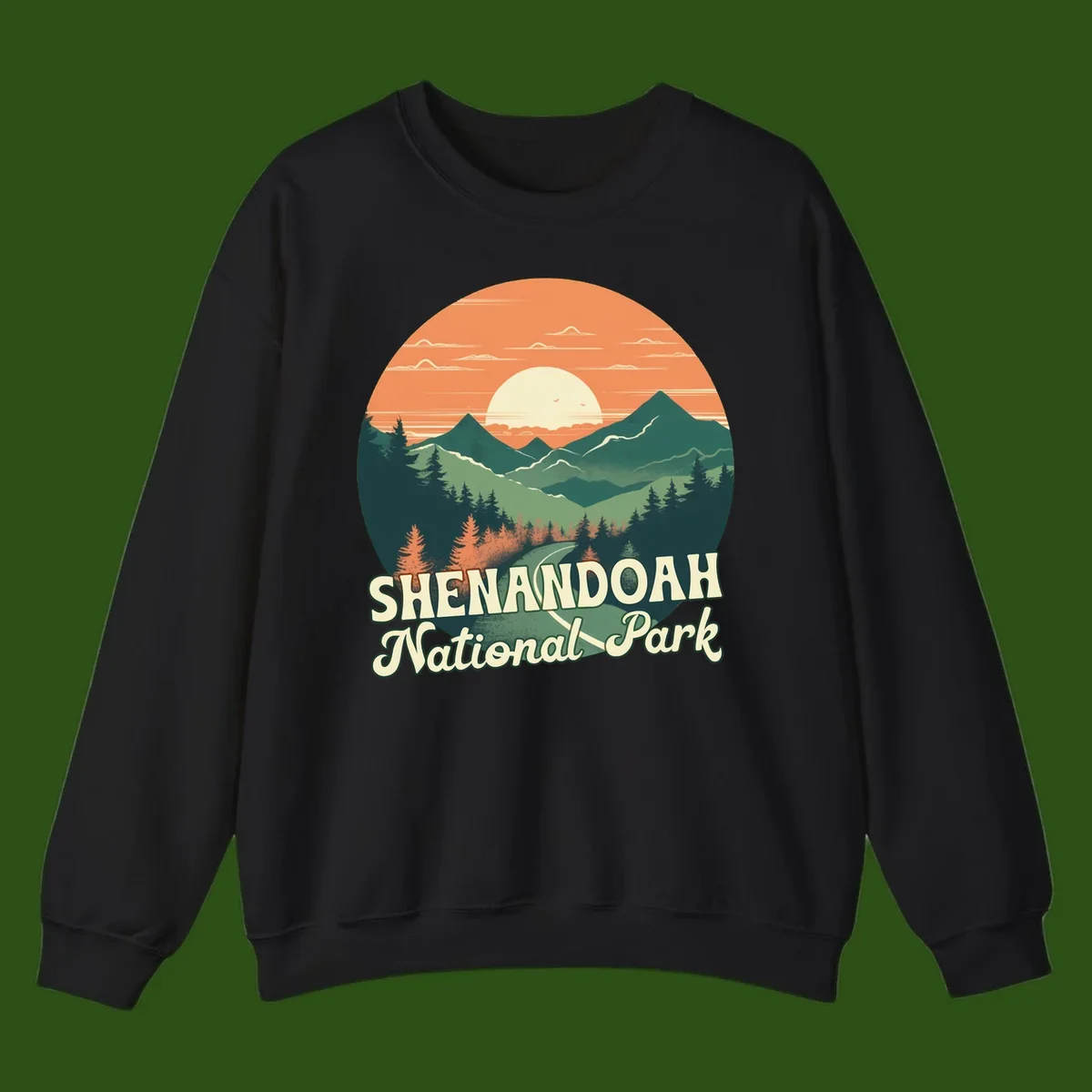 Vintage-style illustration of Shenandoah National Park with layered mountains, evergreen forests, and a large orange sunset sky with text reading Shenandoah National Park.