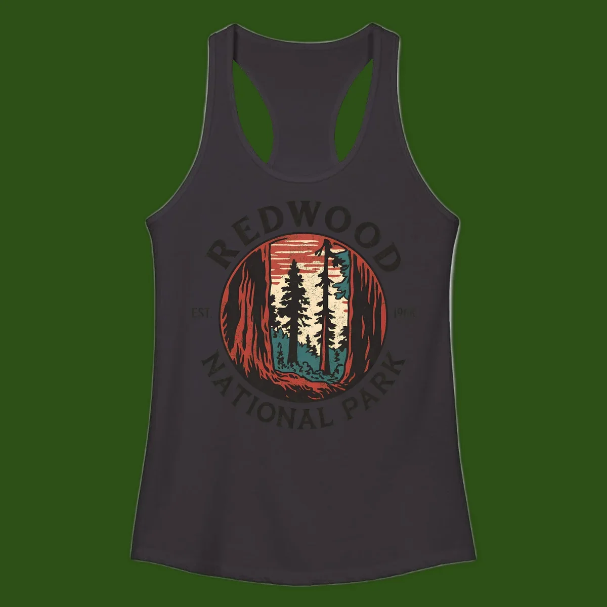 Vintage redwood national park badge design with silhouetted towering trees in circular frame, established 1968