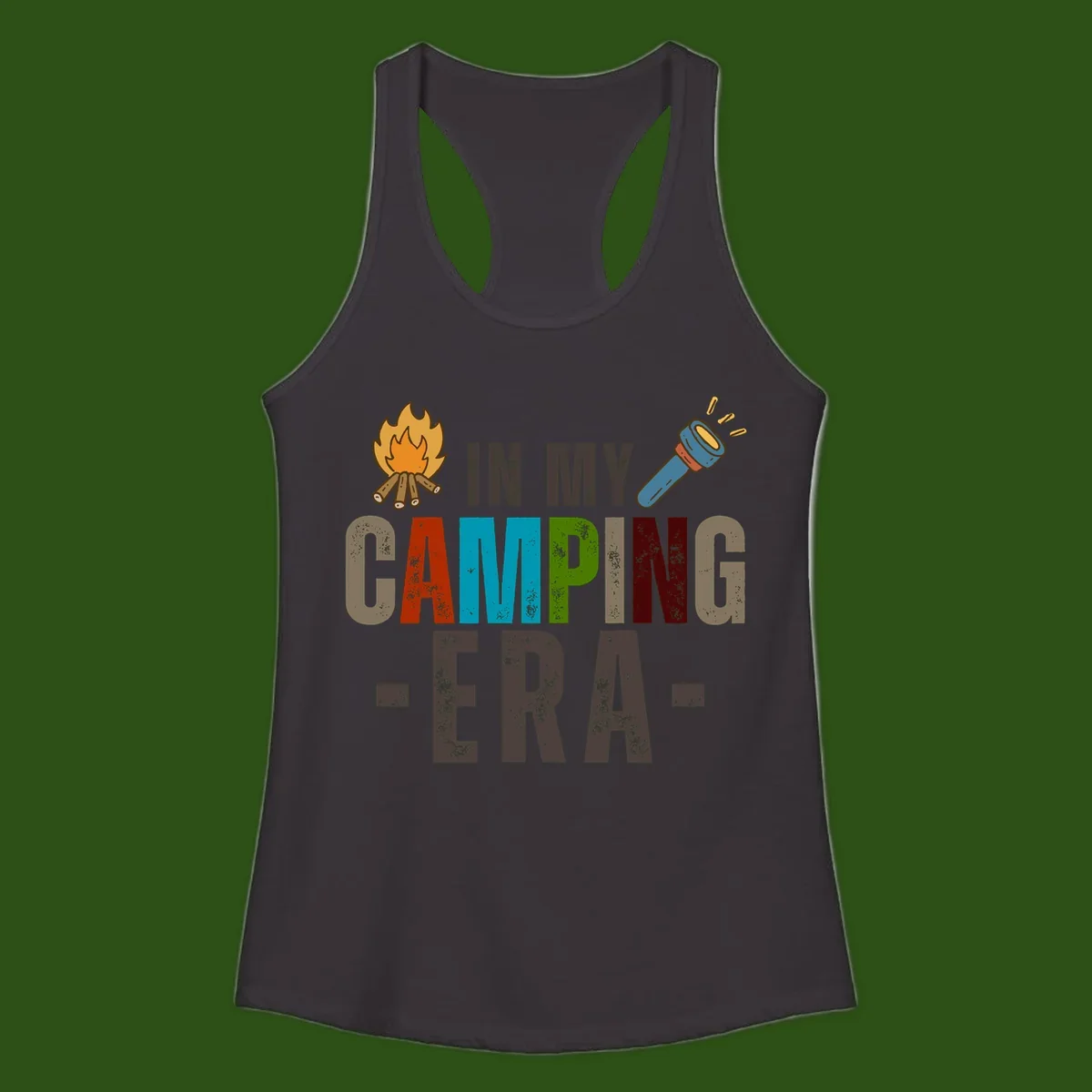 Campfire and flashlight icons flank colorful distressed text reading 'In My Camping Era' on gray background