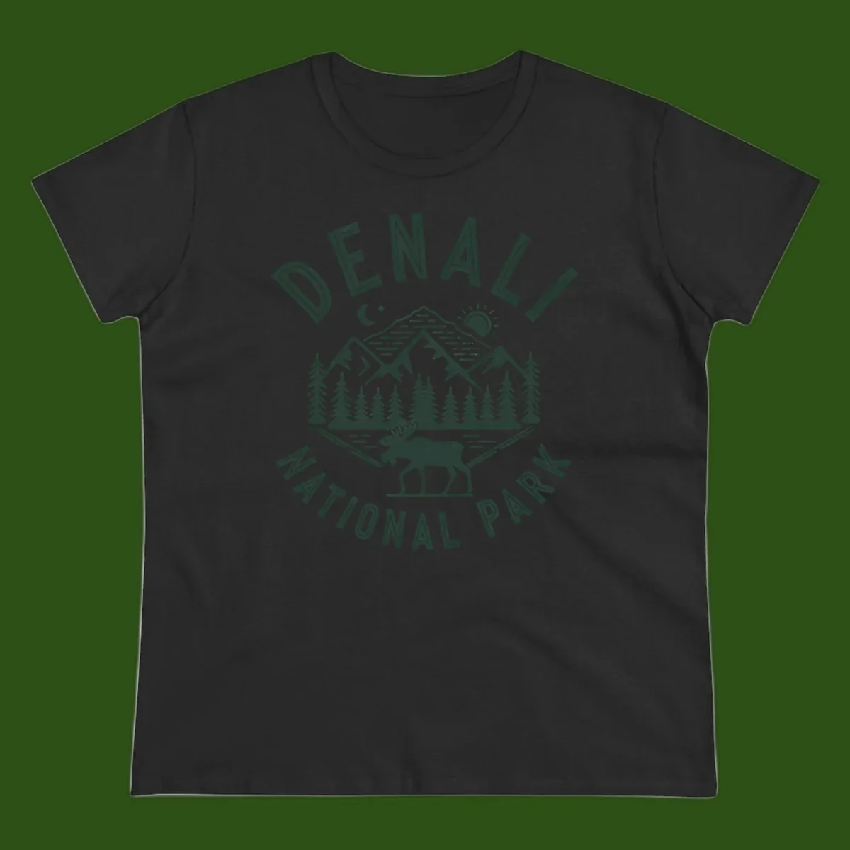 Denial National Park badge design with moose walking through forest, mountains, sun and moon with crossed fishing rods