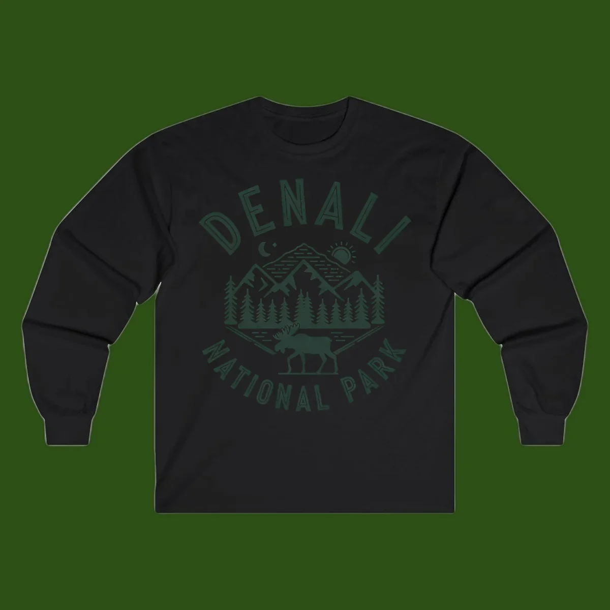 Denial National Park badge design with moose walking through forest, mountains, sun and moon with crossed fishing rods