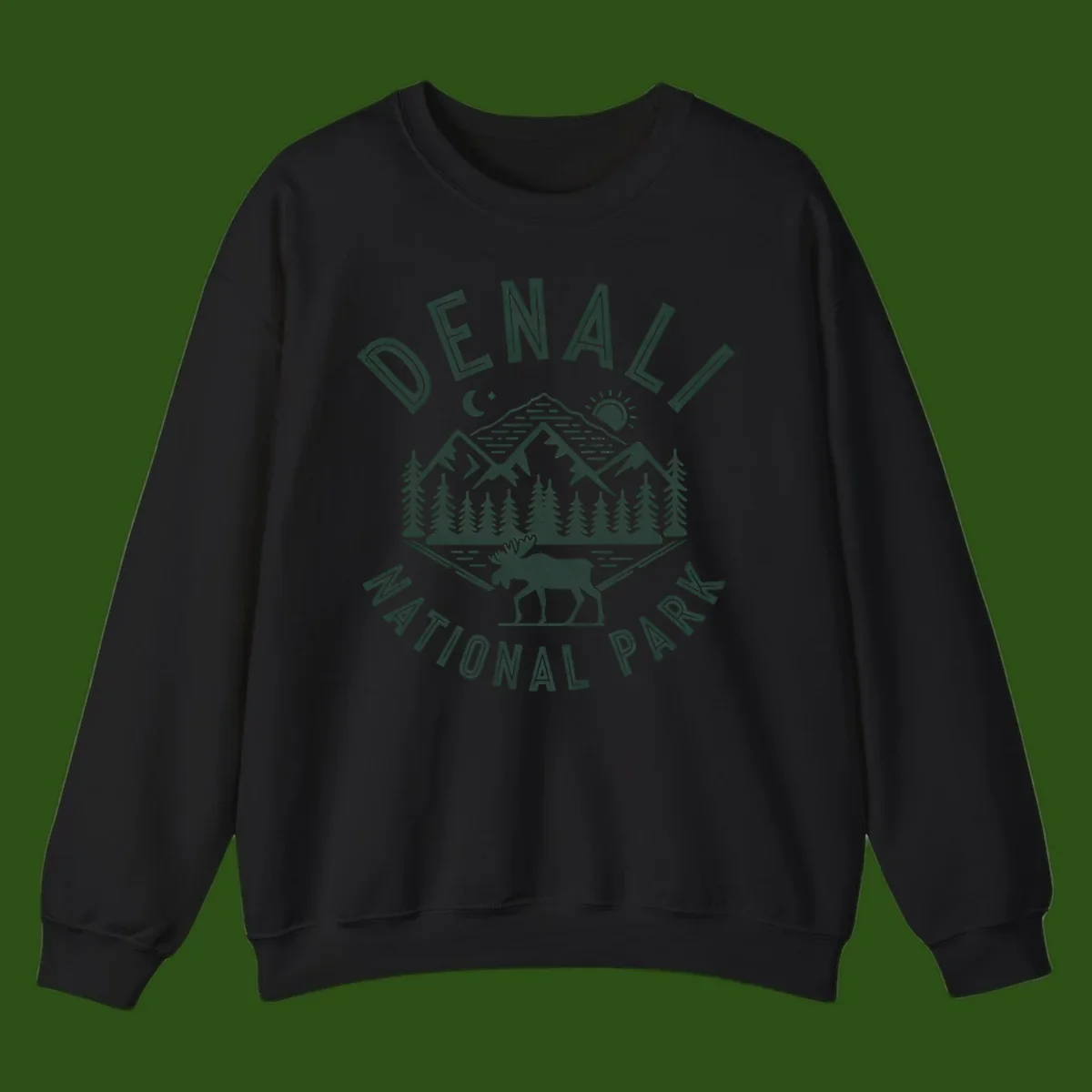 Denial National Park badge design with moose walking through forest, mountains, sun and moon with crossed fishing rods