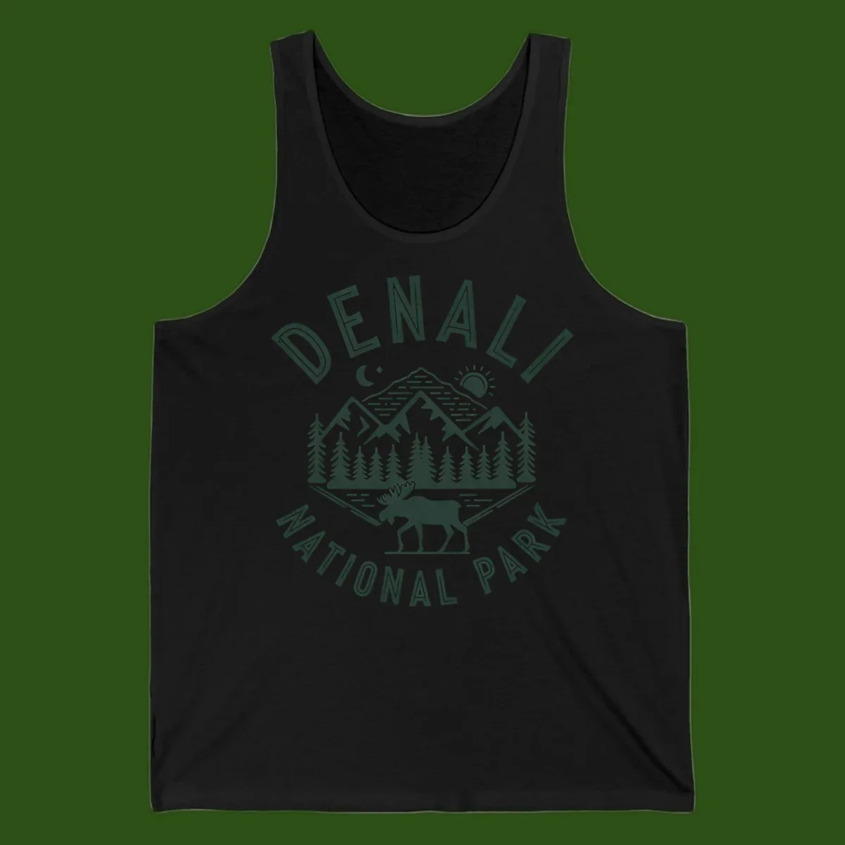 Denial National Park badge design with moose walking through forest, mountains, sun and moon with crossed fishing rods
