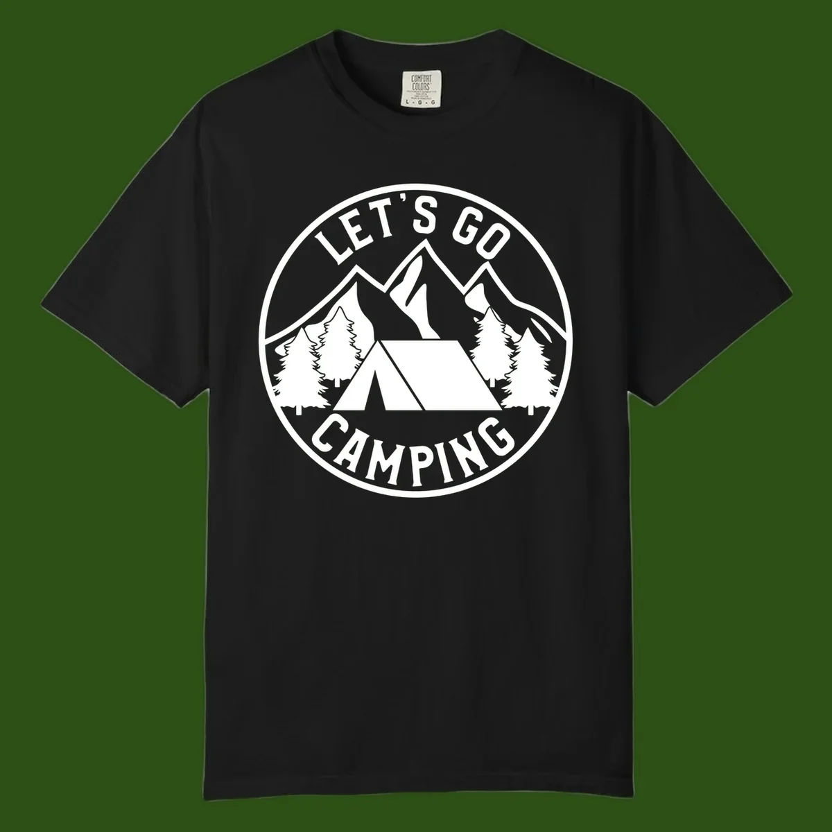 Circular let's go camping badge with tent, trees, and mountains in white and gray