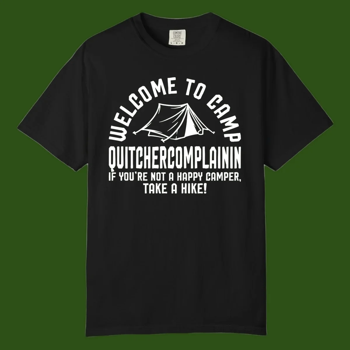White tent illustration with curved text reading 'Welcome to Camp Quitcherecomplaining' and tagline 'If you're not a happy camper, take a hike' on gray background.