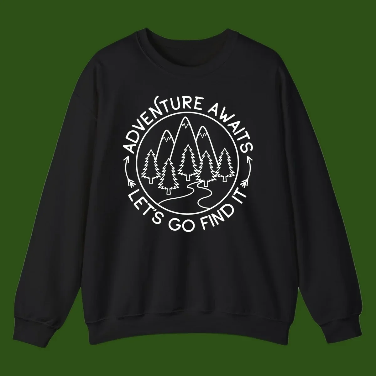 Circular badge with forest scene of evergreen trees and mountains, text reads 'Adventure Awaits Let's Go Find It'