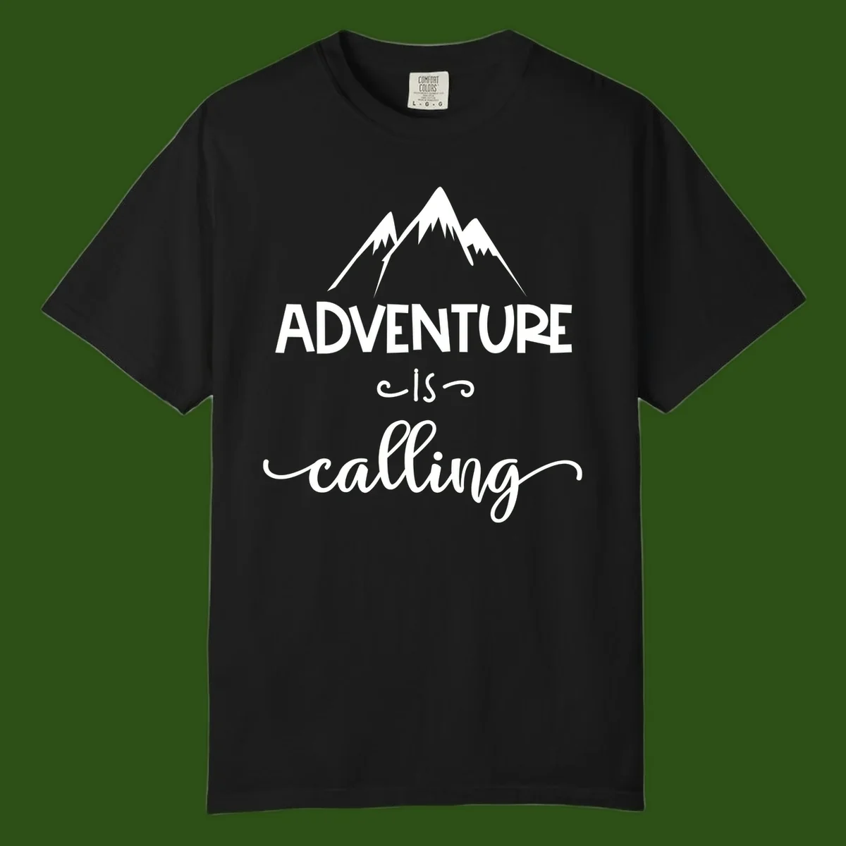 Adventure is calling design with three snow-capped mountain peaks and motivational text on gray background