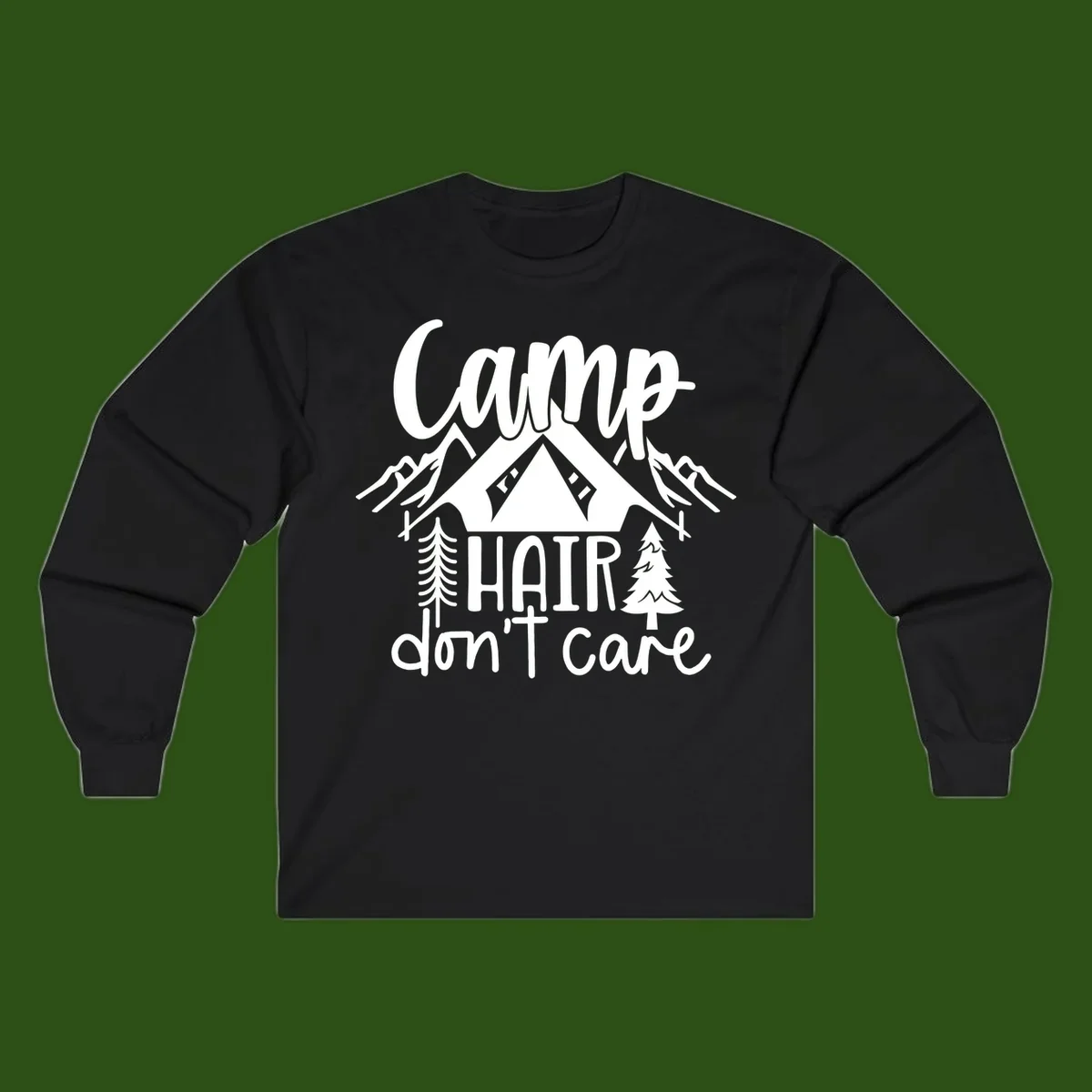 Camp hair don't care design with tent, mountains, pine trees, and campfire illustration with cursive text