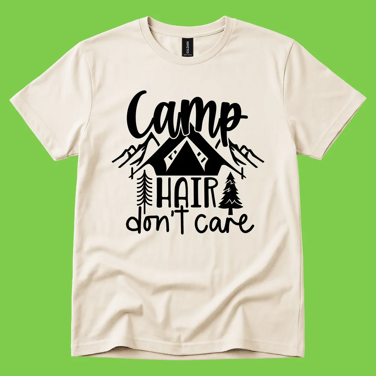 Camp hair don't care design with tent, mountains, pine trees, and campfire illustration with cursive text