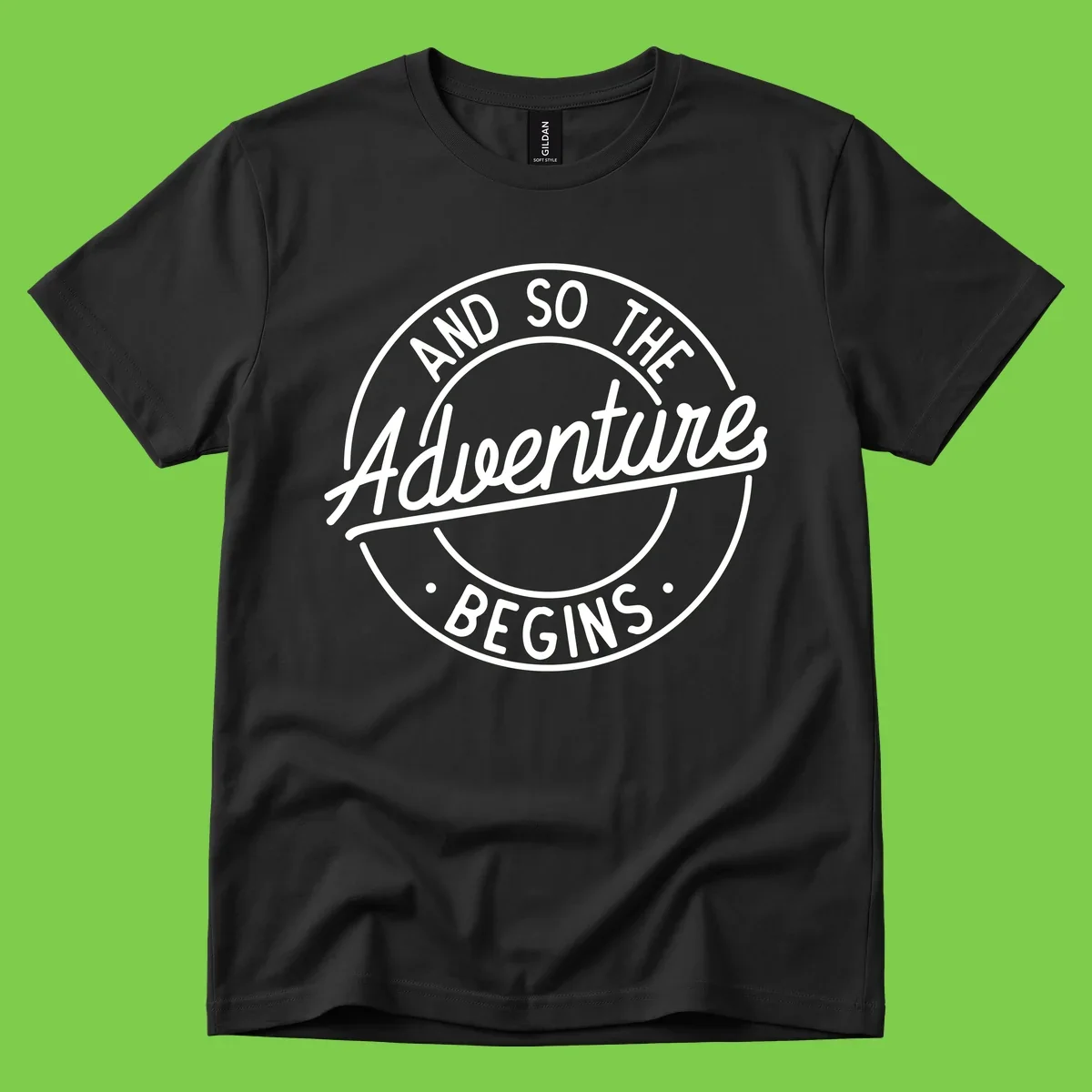 Vintage circular badge design with white text reading 'And So The Adventure Begins' on gray background