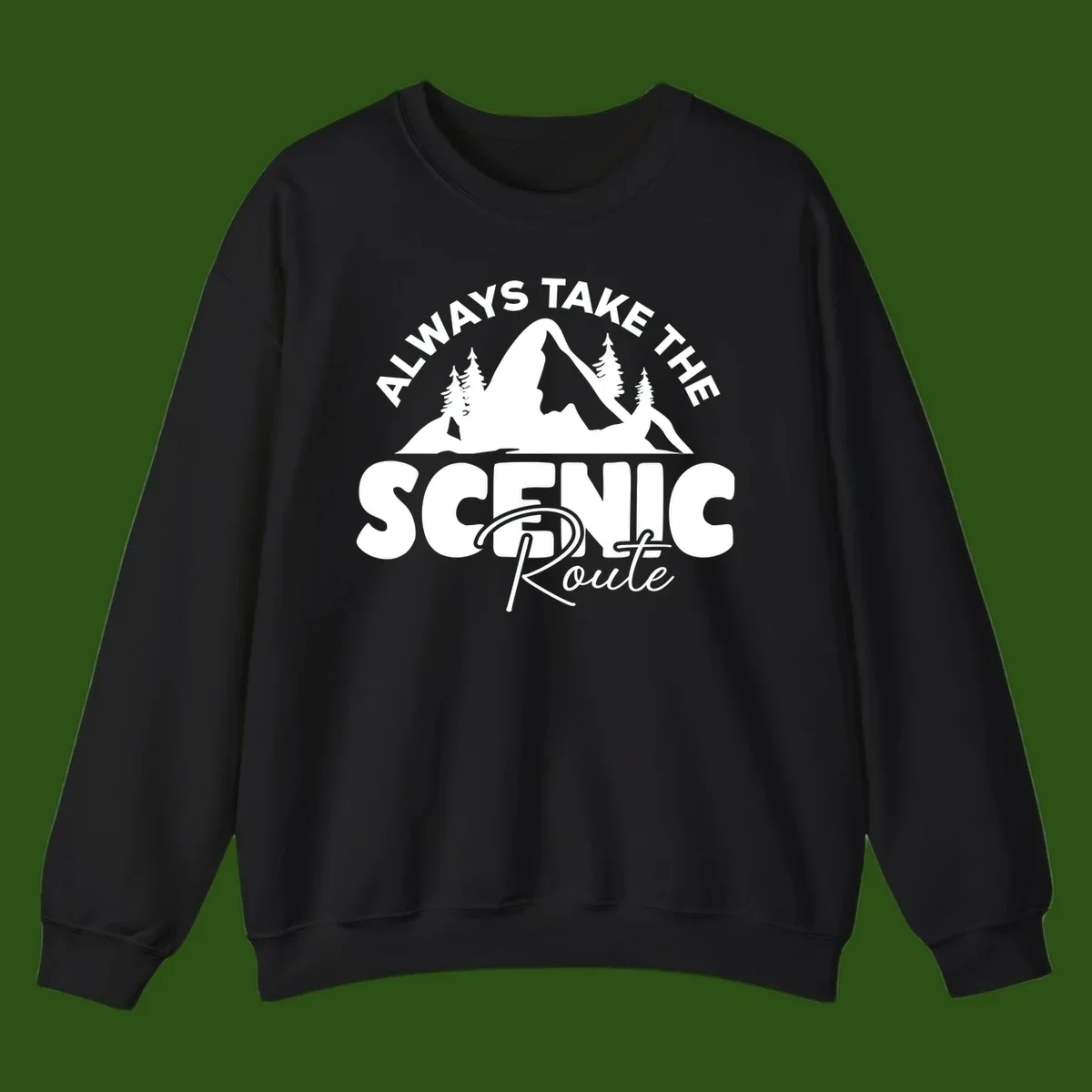 White mountain landscape illustration with evergreen trees and text reading 'All Ways Take The Scenic Route' on gray background