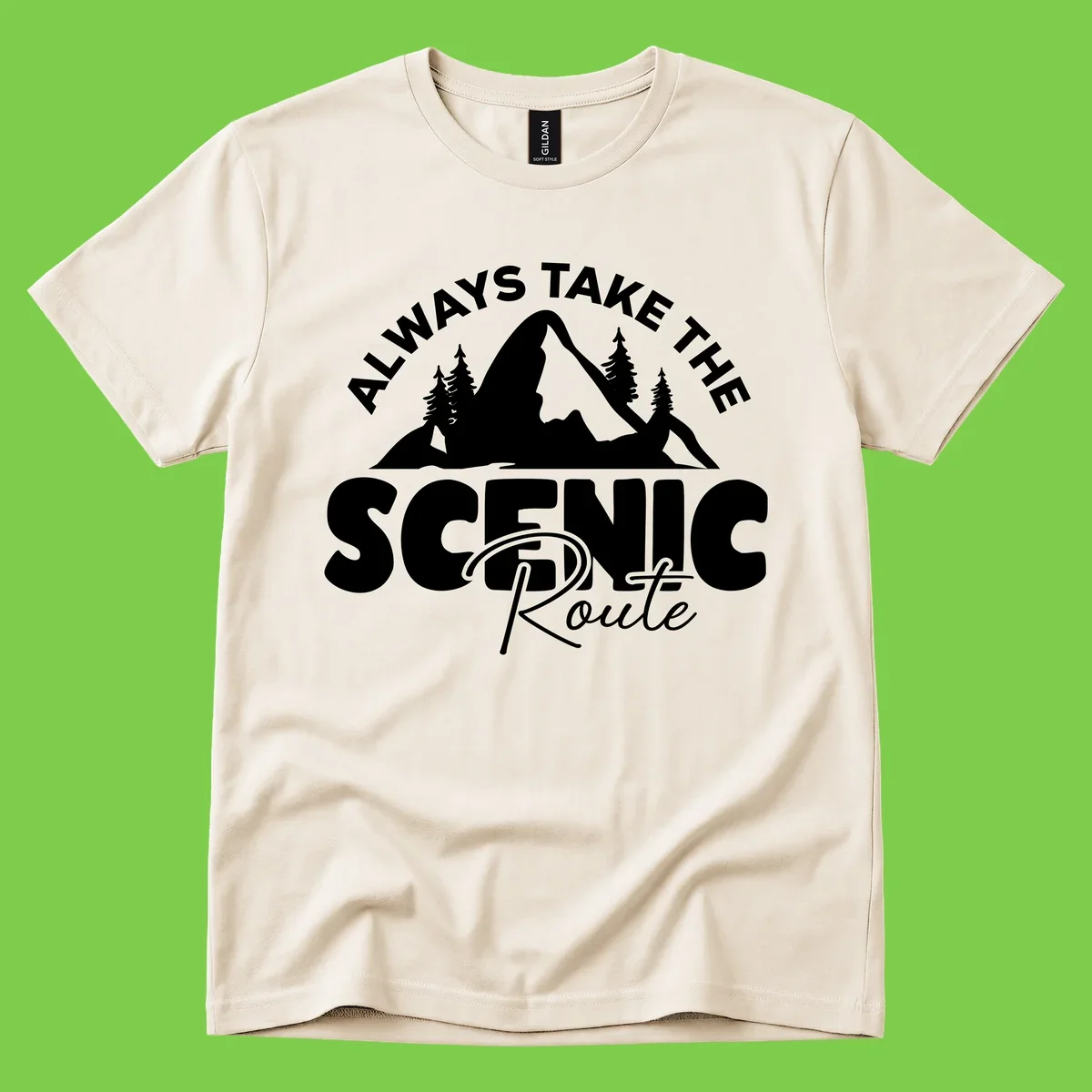 White mountain landscape illustration with evergreen trees and text reading 'All Ways Take The Scenic Route' on gray background