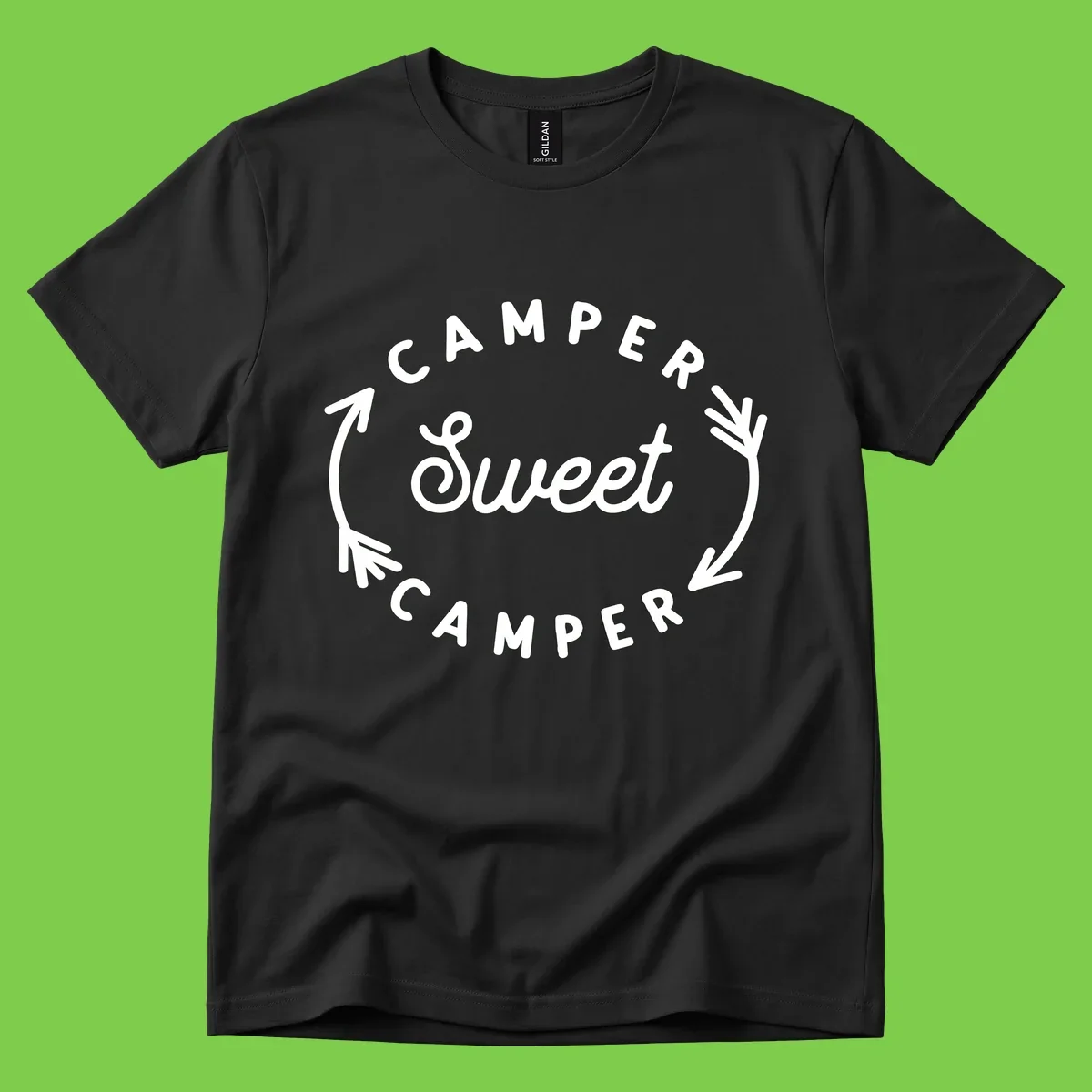 Circular badge design with 'Camper Sweet Camper' text and pine branch decorations in white on gray background