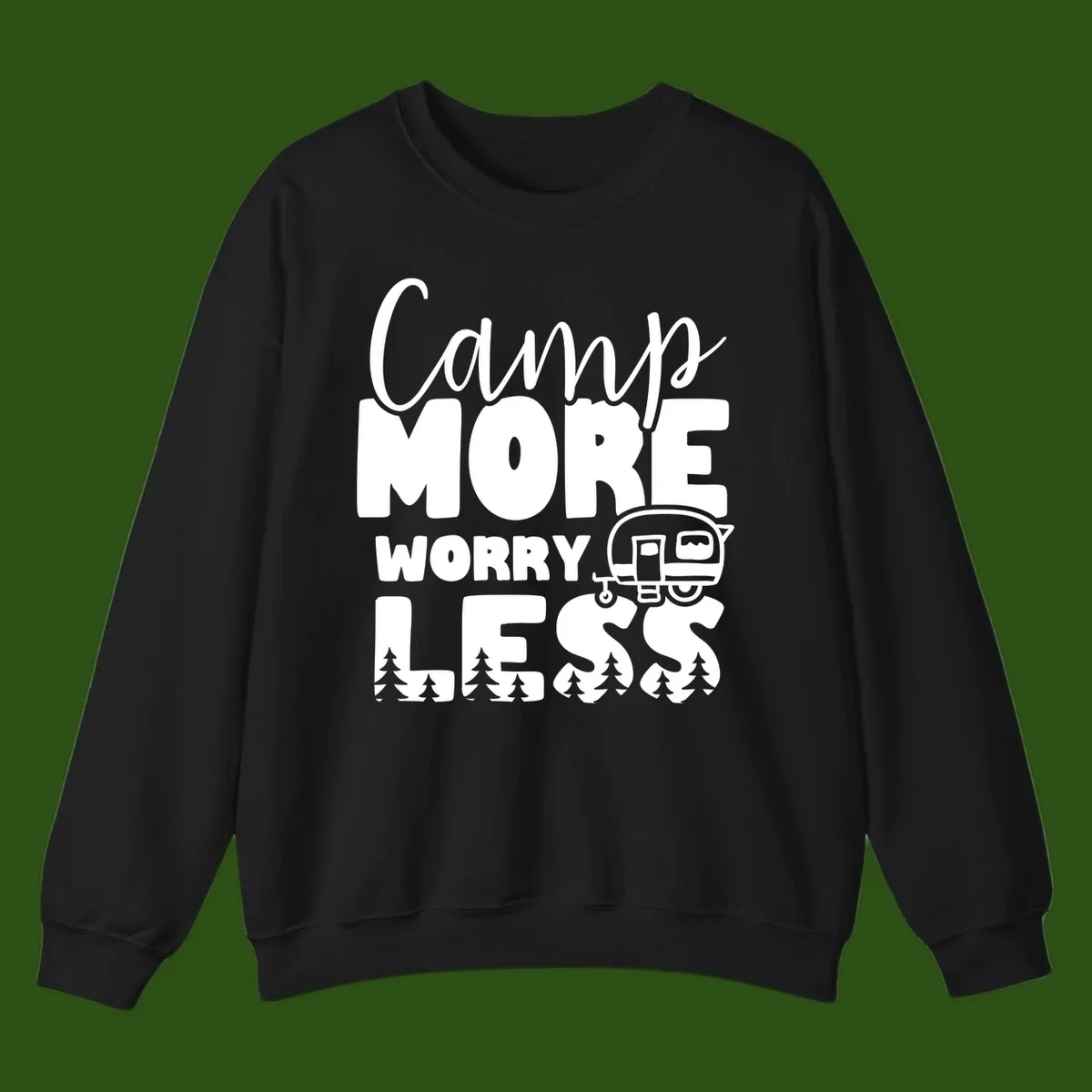 Camp More Worry Less design with flowing script text, camping trailer, and pine trees on gray background