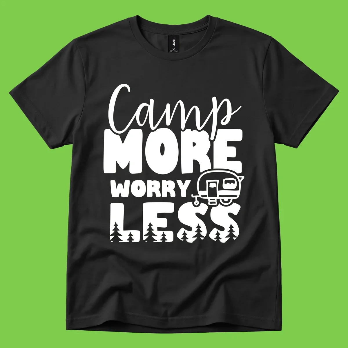 Camp More Worry Less design with flowing script text, camping trailer, and pine trees on gray background