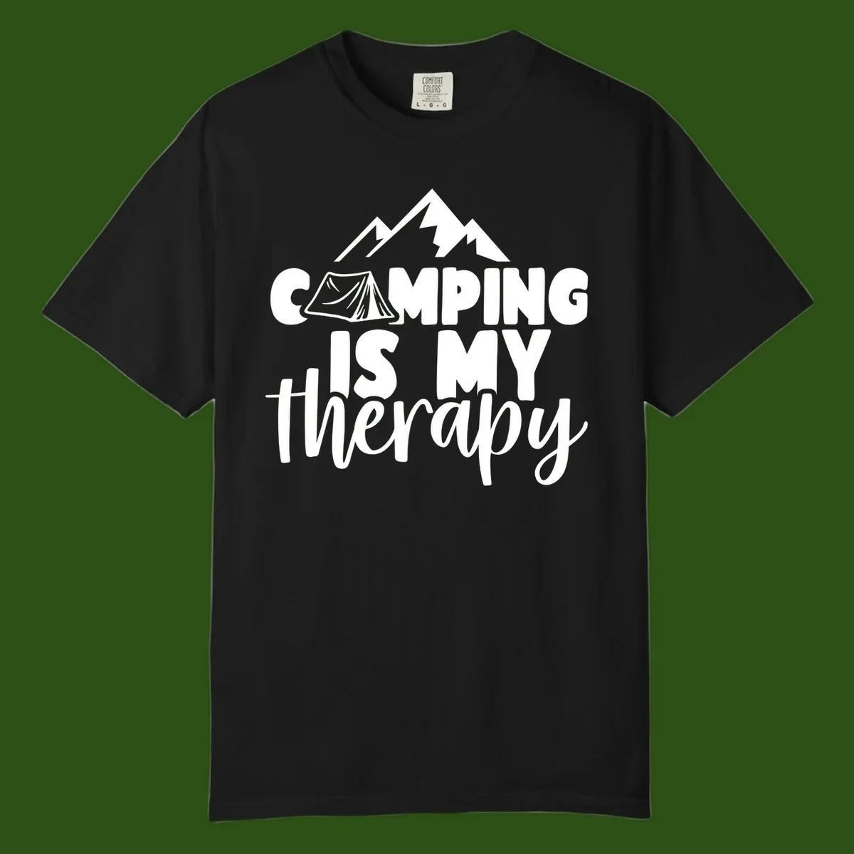 White text reading 'Camping Is My Therapy' with tent and mountain graphic design on gray background