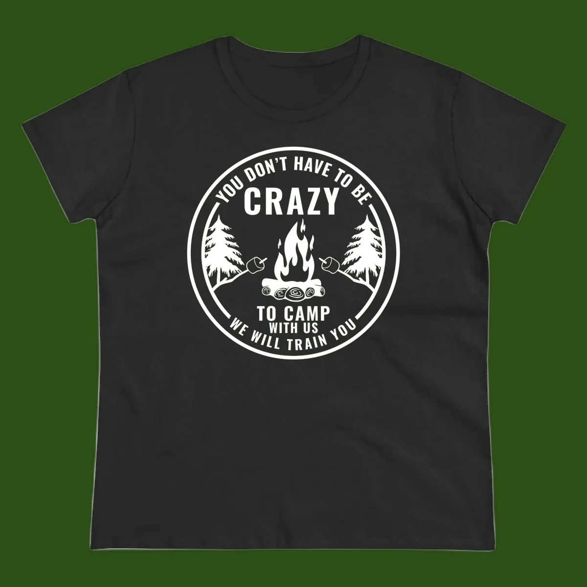 Circular badge design with campfire, pine trees, and marshmallows on sticks with humorous camping text about training crazy campers