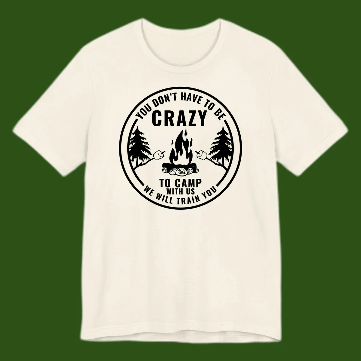Circular badge design with campfire, pine trees, and marshmallows on sticks with humorous camping text about training crazy campers