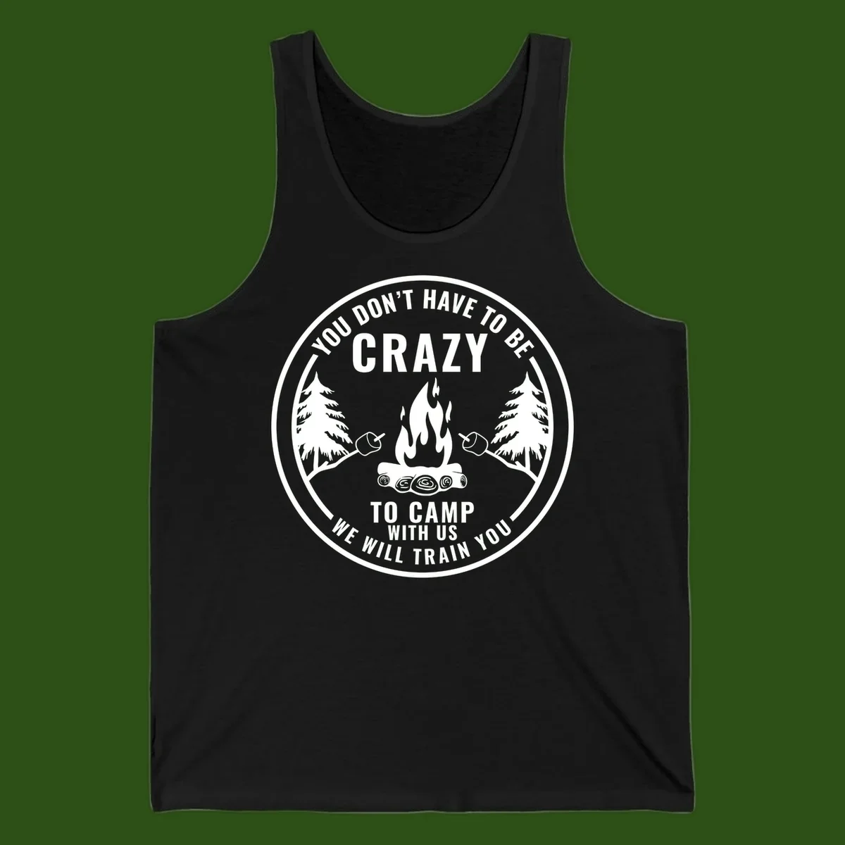 Circular badge design with campfire, pine trees, and marshmallows on sticks with humorous camping text about training crazy campers