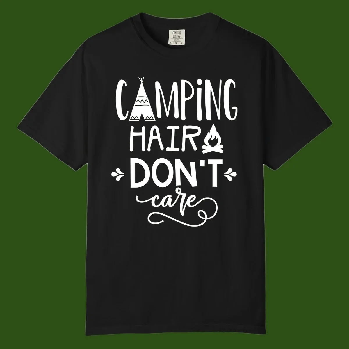 Camping hair don't care design with teepee, campfire, and decorative leaves on gray background