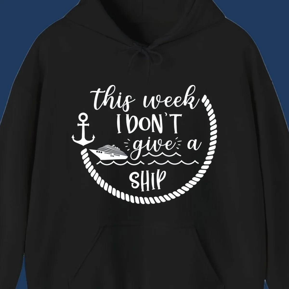 White nautical design with cruise ship, anchor, rope borders, and text reading 'this week, I don't give a ship' on gray background