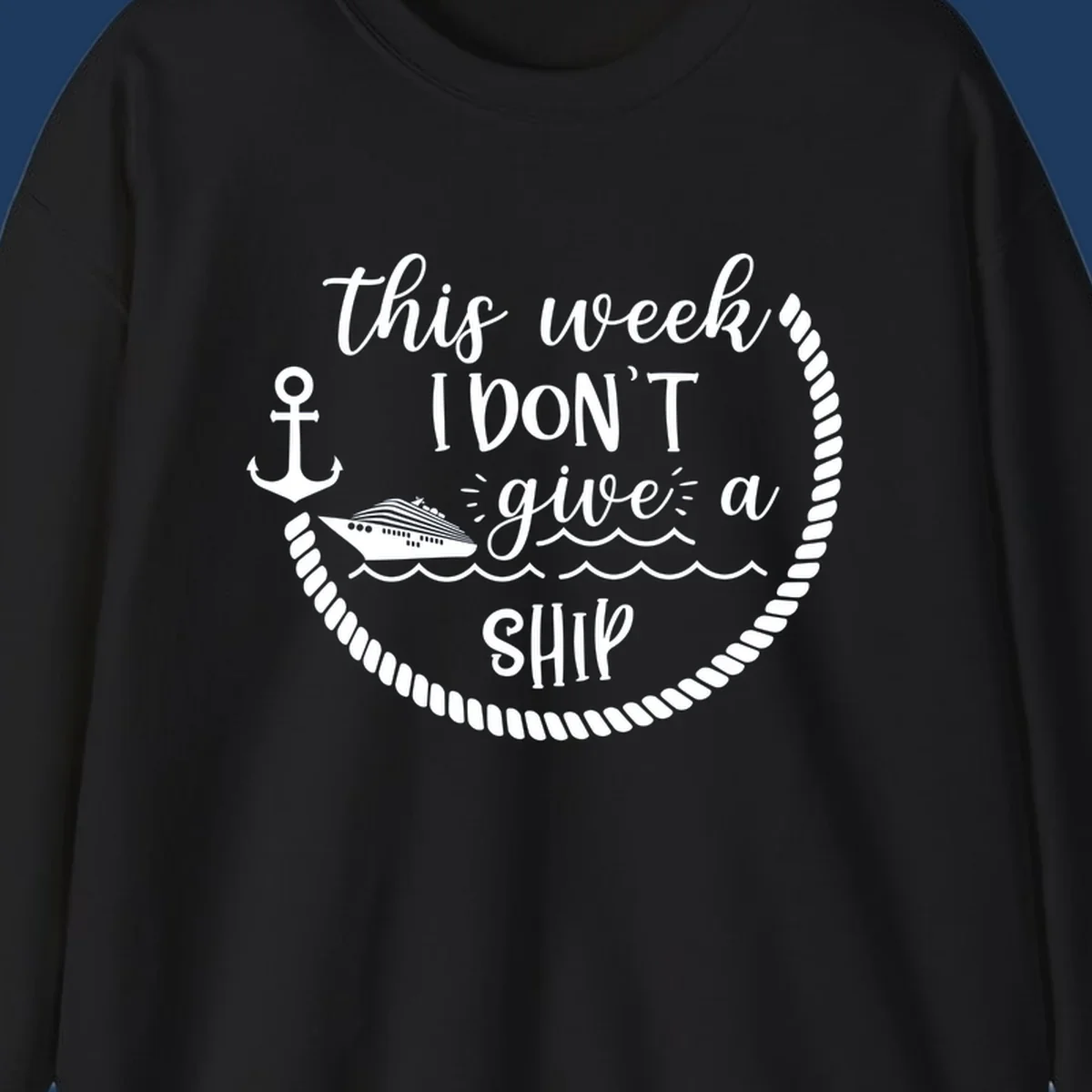 White nautical design with cruise ship, anchor, rope borders, and text reading 'this week, I don't give a ship' on gray background