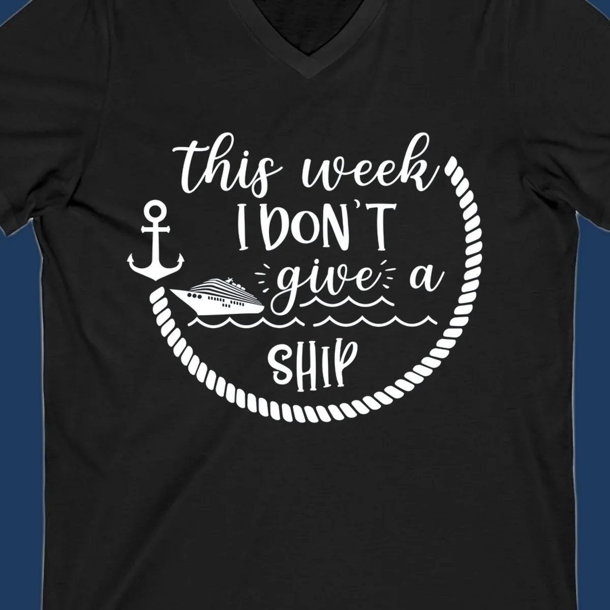White nautical design with cruise ship, anchor, rope borders, and text reading 'this week, I don't give a ship' on gray background