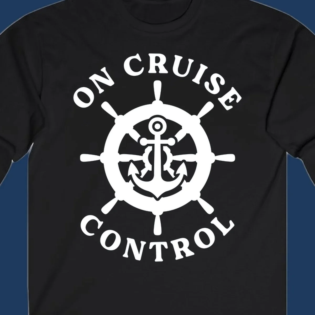 White anchor and ship's wheel badge with 'On Cruise Control' text on gray background