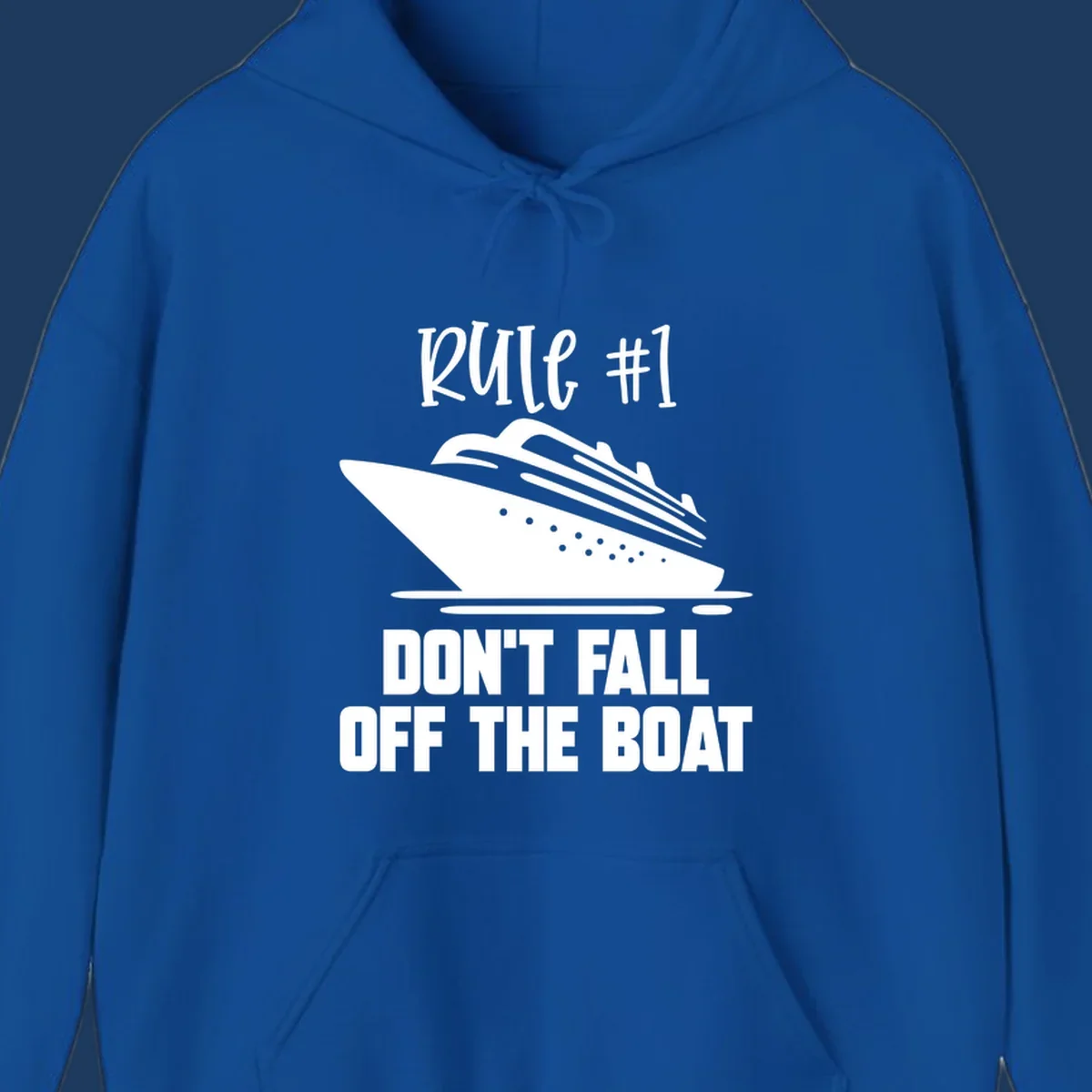 Illustration of a cruise ship with text reading 'Rule #1 Don't Fall Off The Boat' in white on gray background