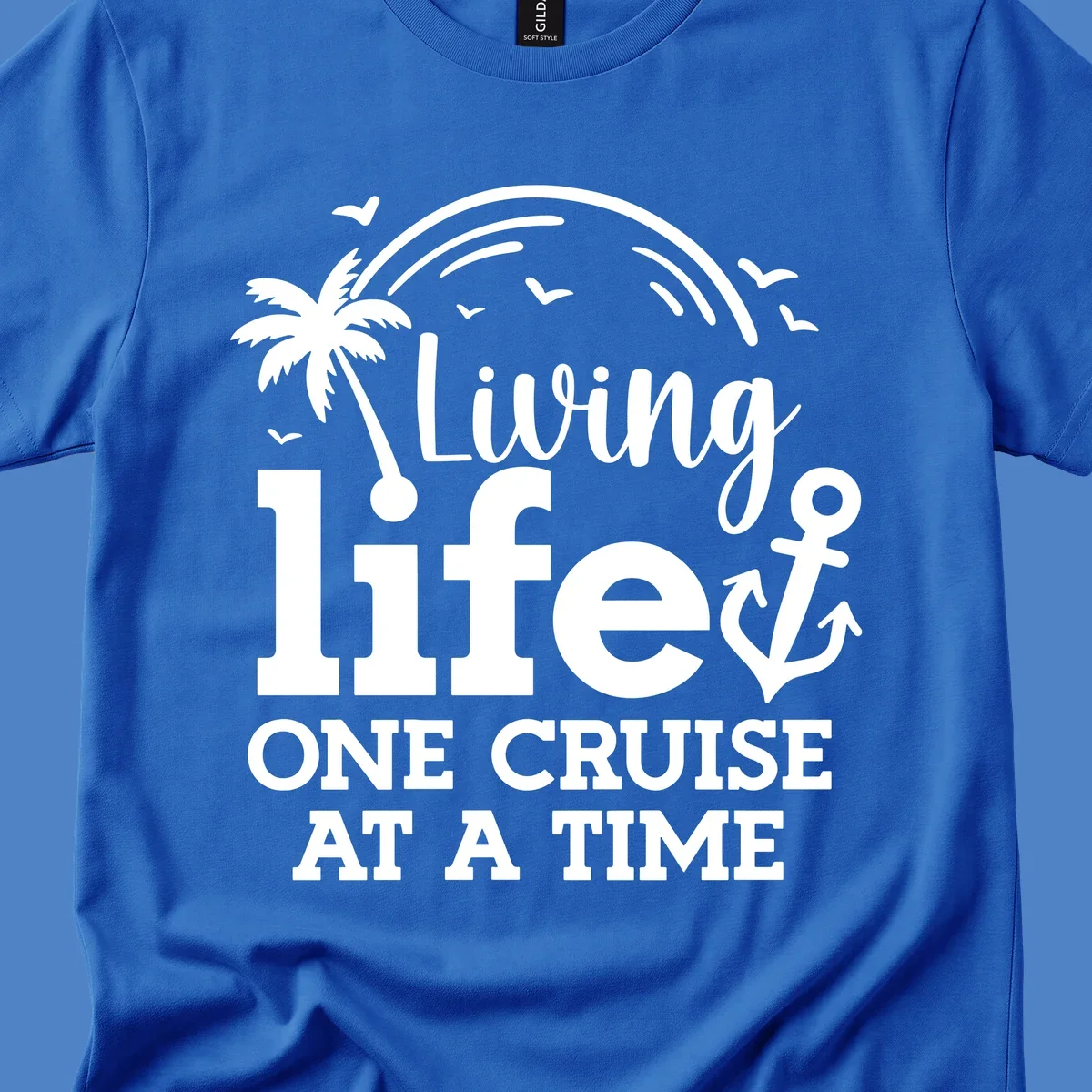 White nautical design with palm tree, anchor, and birds featuring text 'Living life one cruise at a time' on gray background