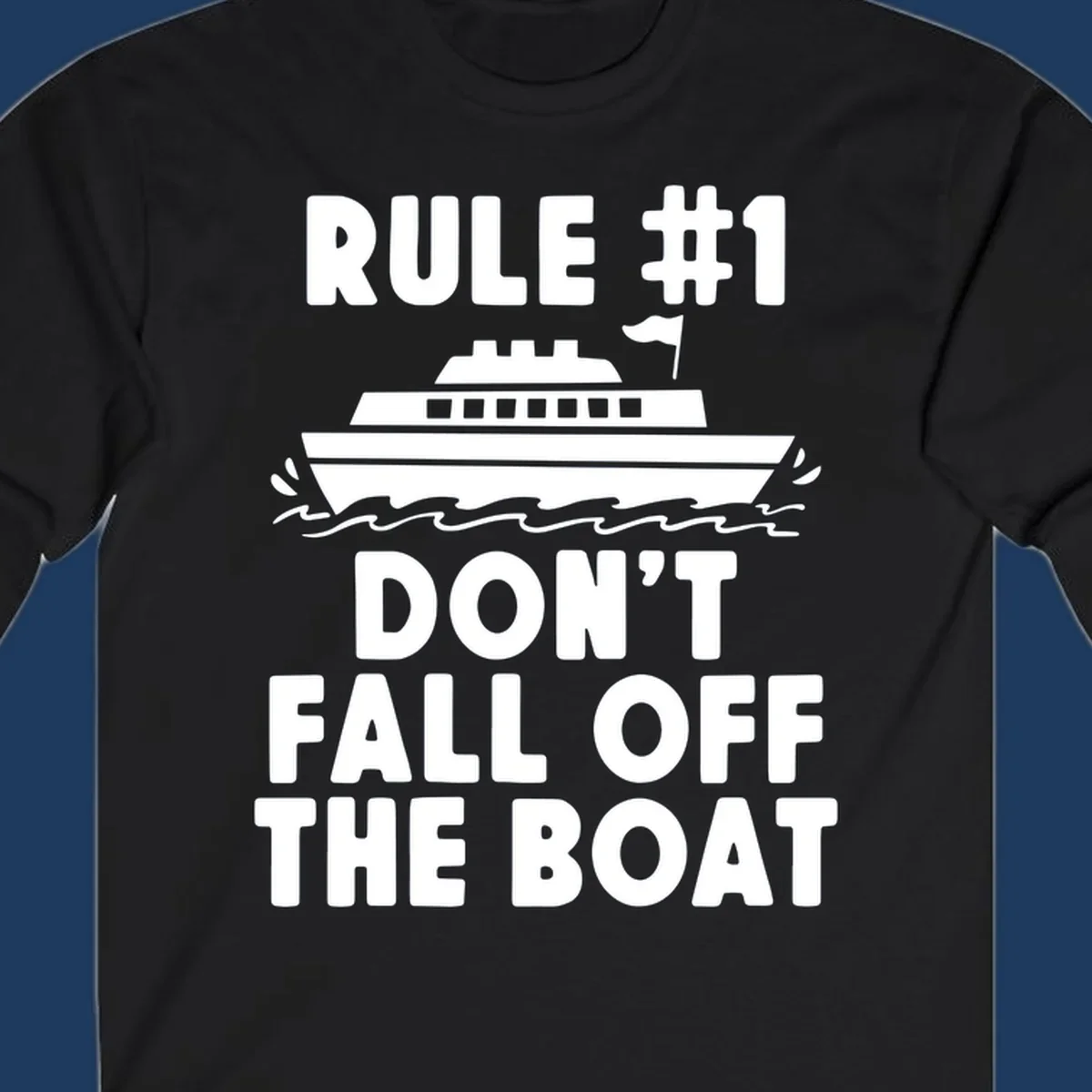 Humorous cruise design with ship illustration and text reading 'Rule #1 Don't Fall Off The Boat' on gray background