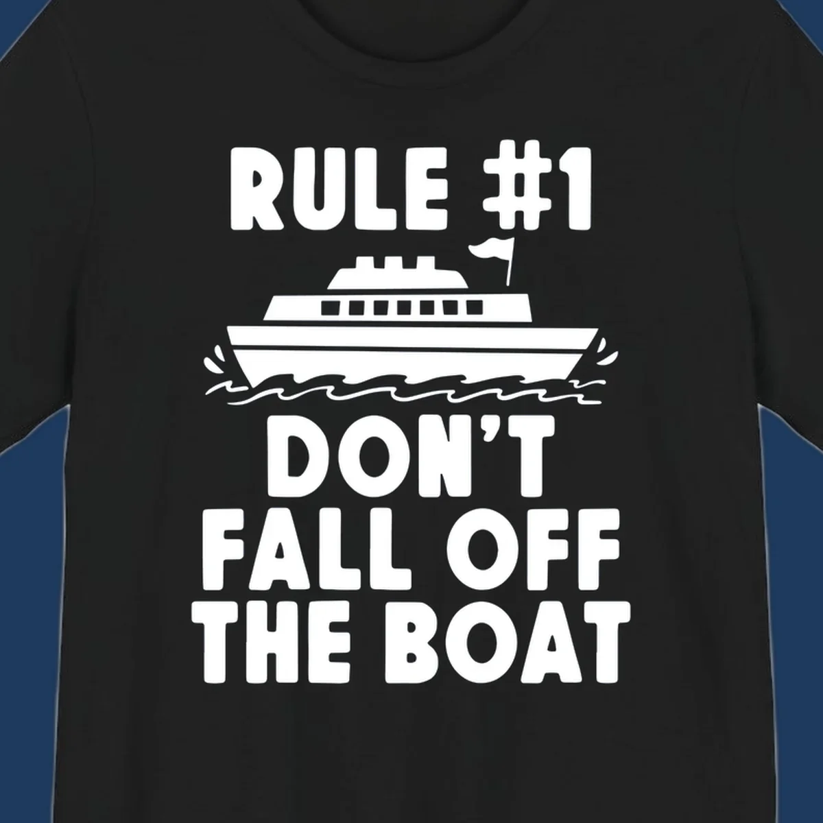 Humorous cruise design with ship illustration and text reading 'Rule #1 Don't Fall Off The Boat' on gray background