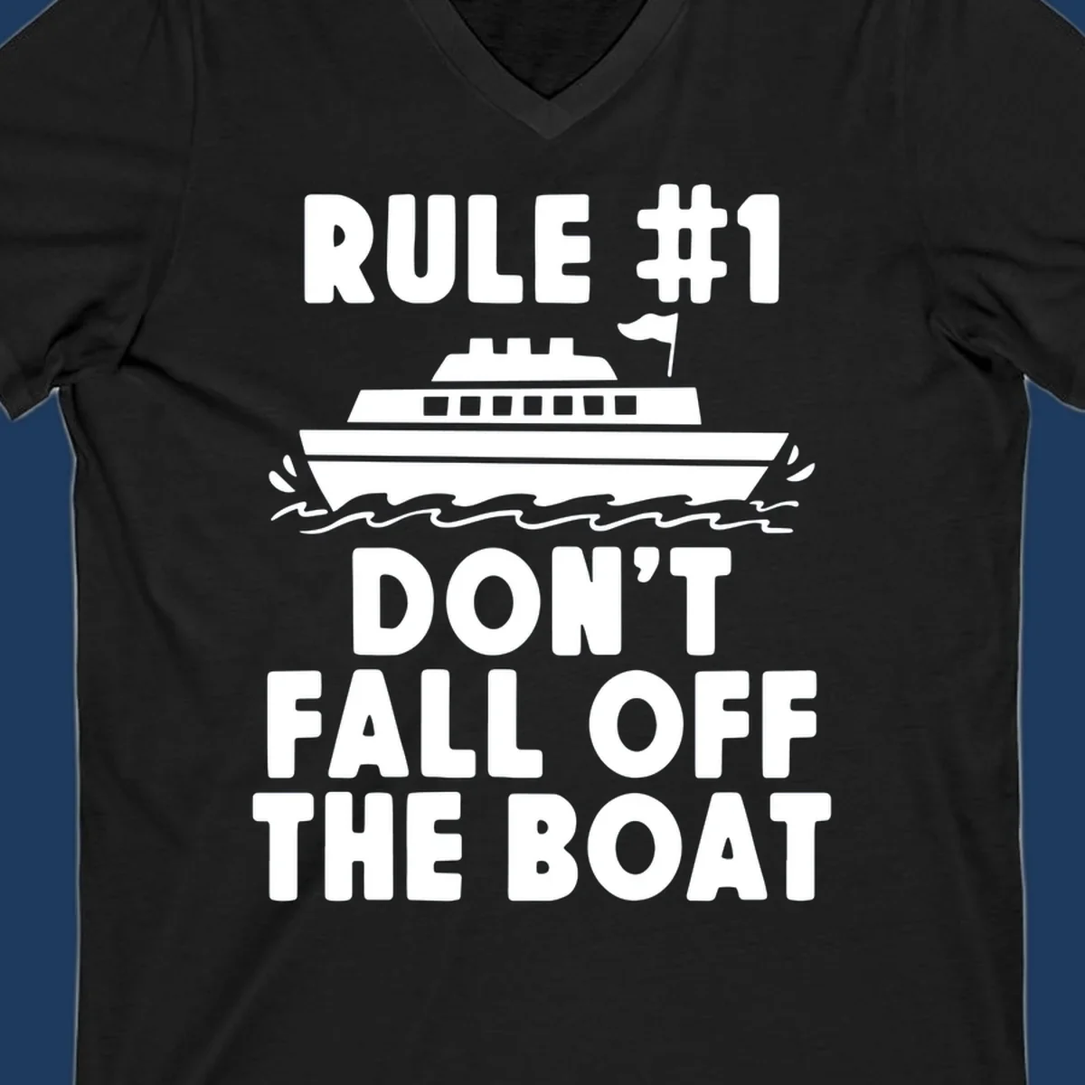 Humorous cruise design with ship illustration and text reading 'Rule #1 Don't Fall Off The Boat' on gray background