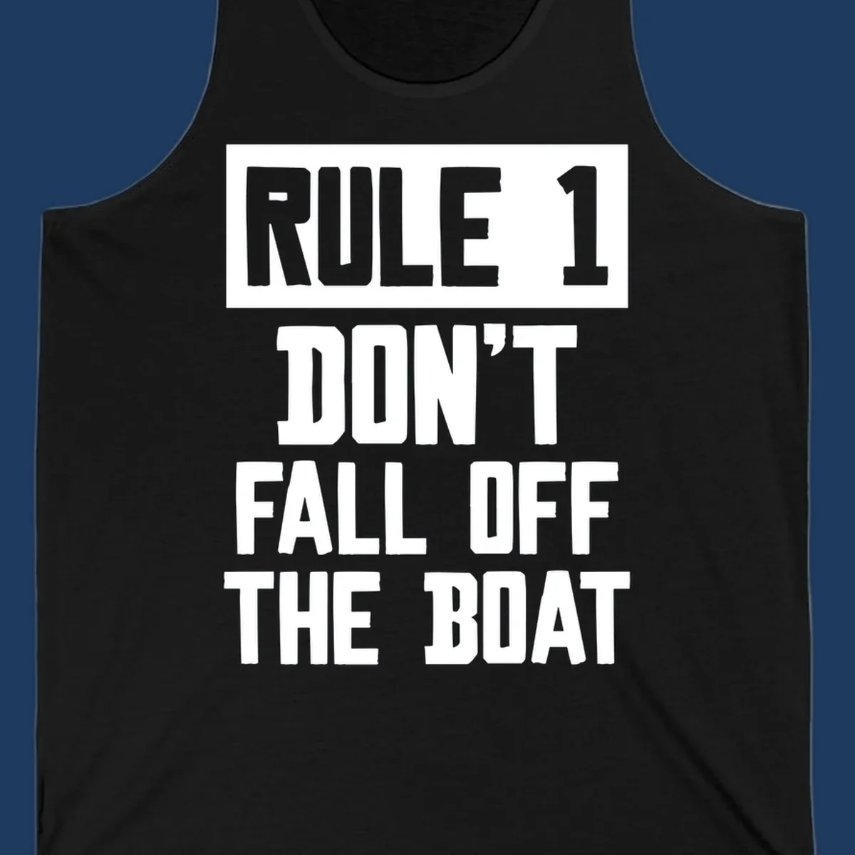 Bold gray and white typography reading 'Rule 1 Don't Fall Off The Boat' - a humorous nautical design
