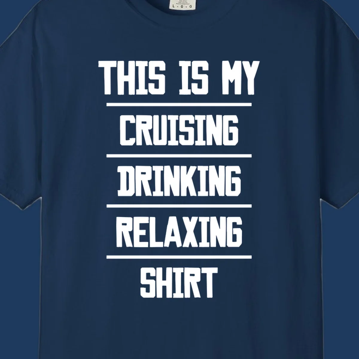 White stacked text on gray background reading 'This Is My Cruising Drinking Relaxing Shirt' with horizontal line dividers