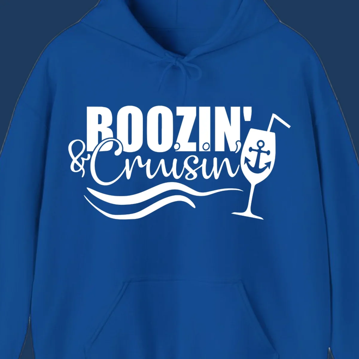 Boozin' and Cruising design with cocktail glass, anchor, and nautical waves in white on gray background